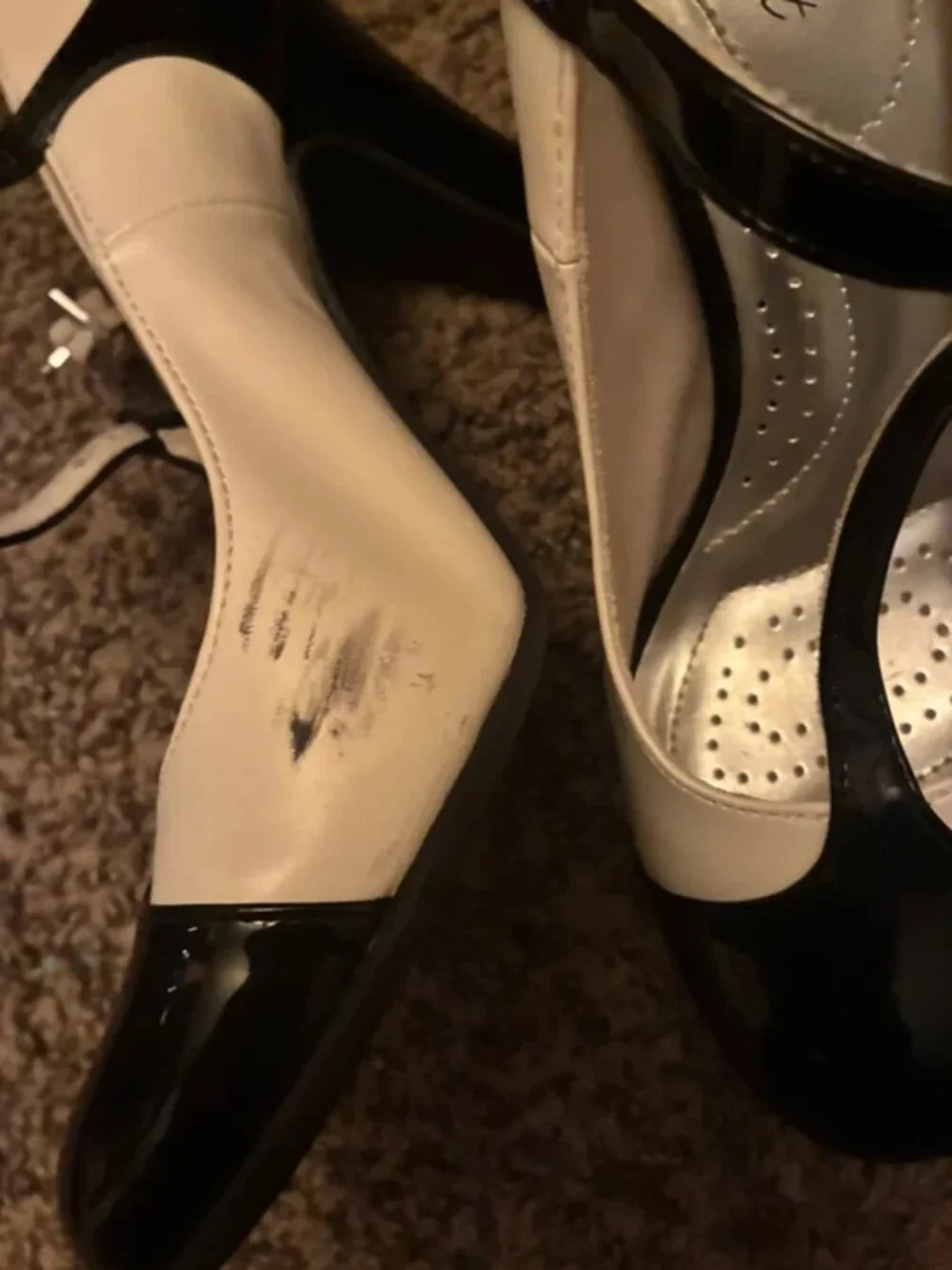 White and black heels